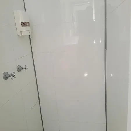 Travellers Paradise Cairns Exterior photo A shower cubicle