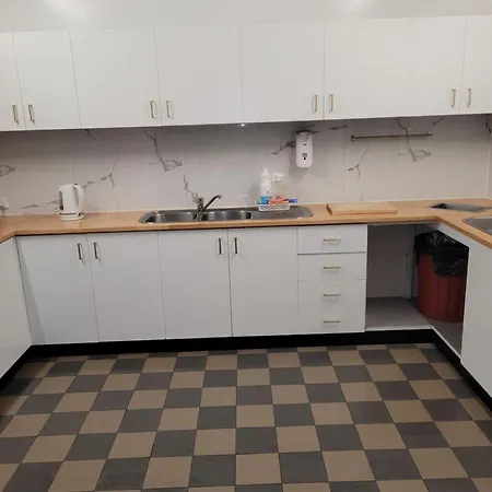 Travellers Paradise Cairns Exterior photo A kitchen in a student residence hall at the University of Michigan